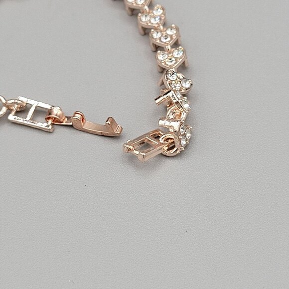 Elegant Rose Gold Tone Heart Tennis Bracelet With Clear Crystal Accents - Picture 5 of 6